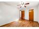 Bedroom with hardwood floors and traditional wood trim at 474 Upper Burris Rd, Canton, GA 30114
