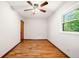 Bright bedroom with hardwood floors, natural light, and ceiling fan at 474 Upper Burris Rd, Canton, GA 30114