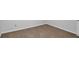 The unfinished basement features neutral carpeting and white trim at 6625 Peppermill Ln, South Fulton, GA 30349