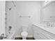 Updated bathroom with white vanity, new fixtures, and a shower-tub combination at 6625 Peppermill Ln, South Fulton, GA 30349