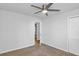 Bedroom featuring neutral carpet, a modern ceiling fan, and door to other rooms at 6625 Peppermill Ln, South Fulton, GA 30349