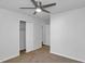 This carpeted bedroom features a closet and access to other rooms at 6625 Peppermill Ln, South Fulton, GA 30349