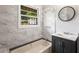 Bathroom featuring a vanity, toilet, and tub/shower combination with tiled walls and a window at 765 Shellnut Dr, Forest Park, GA 30297