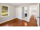 Bedroom with hardwood floors, closet, and natural light near ensuite bathroom at 765 Shellnut Dr, Forest Park, GA 30297