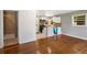 Open floor plan showcasing the kitchen with modern appliances, island and breakfast bar at 765 Shellnut Dr, Forest Park, GA 30297