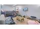 Cozy bedroom with bunk beds, a sofa, a TV, and neutral carpet at 100 Braxton Way, Roswell, GA 30075