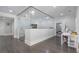 Large bonus room with gray walls, hardwood floors, glass encased sauna, and an art station at 100 Braxton Way, Roswell, GA 30075
