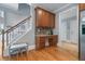 Kitchen with desk nook under the stairs at 100 Braxton Way, Roswell, GA 30075