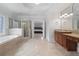 Spacious bathroom with a glass shower and large tub at 100 Braxton Way, Roswell, GA 30075