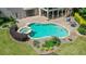 Beautiful pool with spa, stone surround, brick patio and manicured landscaping. A great place to relax and enjoy the outdoors at 100 Braxton Way, Roswell, GA 30075