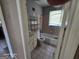 Retro-style bathroom showcasing a bathtub, sink, toilet, and vintage pink tile at 1243 Hill Nw St, Conyers, GA 30012