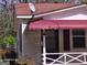 Close up shot of front porch with porch sign at 1243 Hill Nw St, Conyers, GA 30012