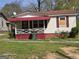 Charming home with a red awning at 1243 Hill Nw St, Conyers, GA 30012