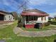Modest single-story home with a small covered porch and original architectural details at 1243 Hill Nw St, Conyers, GA 30012