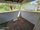 An empty enclosed porch with a backyard view at 1243 Hill Nw St, Conyers, GA 30012