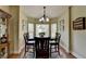 Charming dining area features a bay window and hardwood floors at 1815 Sharon Rd, Cumming, GA 30041