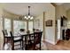 Charming dining area features a bay window and hardwood floors at 1815 Sharon Rd, Cumming, GA 30041
