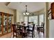 Charming dining area features a bay window and hardwood floors at 1815 Sharon Rd, Cumming, GA 30041