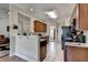 Open kitchen showcasing wood cabinets and granite countertops at 1815 Sharon Rd, Cumming, GA 30041