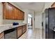 Spacious kitchen featuring wooden cabinets and granite countertops at 1815 Sharon Rd, Cumming, GA 30041