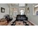 Spacious living room with high ceilings and comfortable seating at 1815 Sharon Rd, Cumming, GA 30041