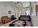 Spacious living room with high ceilings and comfortable seating at 1815 Sharon Rd, Cumming, GA 30041