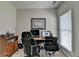 Office space with plush carpeting, natural light, and neutral color scheme at 1815 Sharon Rd, Cumming, GA 30041