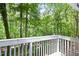 View of lush greenery from the backyard deck at 3684 Regent Nw Dr, Kennesaw, GA 30144
