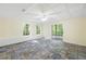 Finished basement with decorative flooring, recessed lighting, and access to the yard at 3684 Regent Nw Dr, Kennesaw, GA 30144