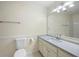 Bathroom featuring a large vanity with granite countertop and a framed mirror at 3684 Regent Nw Dr, Kennesaw, GA 30144