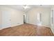 Main bedroom with wood-look floors and ensuite access at 3684 Regent Nw Dr, Kennesaw, GA 30144