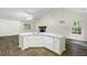 Open kitchen featuring white cabinetry, granite countertops, and stainless steel appliances at 3684 Regent Nw Dr, Kennesaw, GA 30144