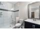 Modern bathroom with a glass-enclosed shower, sleek vanity, and tiled walls for a clean and stylish look at 6763 Encore Blvd, Atlanta, GA 30328