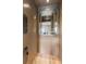 Home elevator with wood floor and wall mounted call button at 6763 Encore Blvd, Atlanta, GA 30328