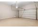 Spacious two car garage with painted floor, automatic door and plenty of room for storage at 6763 Encore Blvd, Atlanta, GA 30328