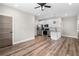 Spacious open-concept kitchen with stainless steel appliances and hardwood floors at 6763 Encore Blvd, Atlanta, GA 30328