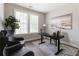 Stylish home office with great natural light, modern decor, and comfortable seating at 6763 Encore Blvd, Atlanta, GA 30328