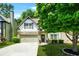 Charming home with a stone-accented facade, two-car garage, and a neatly landscaped front yard at 1326 Castleberry Dr, Buford, GA 30518