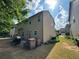 The backyard has a seating area and is surrounded by trees at 4305 Evans Farms Dr, Cumming, GA 30040