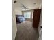 Bedroom with carpet, a window, and a bed with a plastic protective cover over it at 4305 Evans Farms Dr, Cumming, GA 30040