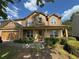 Charming two-story home with stone accents, covered porch, and well-maintained landscaping at 4305 Evans Farms Dr, Cumming, GA 30040