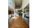 Open foyer with hardwood flooring, staircase to the upper level, and access to multiple living spaces at 4305 Evans Farms Dr, Cumming, GA 30040
