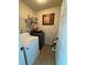 Laundry room with a washer, dryer, and wire shelving offering plenty of space for storage at 4305 Evans Farms Dr, Cumming, GA 30040