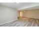 This large finished basement offers versatile space with updated flooring and lighting at 5312 Brittany Trl, Atlanta, GA 30349