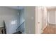 View of the home's entryway, showing the staircase and access to the hallway at 5312 Brittany Trl, Atlanta, GA 30349