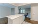 Open concept kitchen with a central island, hardwood and marble floors, great for entertaining at 5312 Brittany Trl, Atlanta, GA 30349