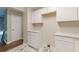 Beautiful kitchen with white cabinets, marble countertops, and a view of the backyard at 5312 Brittany Trl, Atlanta, GA 30349