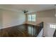 Bright living room with hardwood floors, neutral walls, ceiling fan and natural light at 5312 Brittany Trl, Atlanta, GA 30349