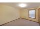 Bedroom featuring a window that provides natural light at 999 Wiley Bridge Rd, Woodstock, GA 30188