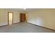 Large bedroom showcasing neutral carpet, closet, and adjoining bathroom at 999 Wiley Bridge Rd, Woodstock, GA 30188